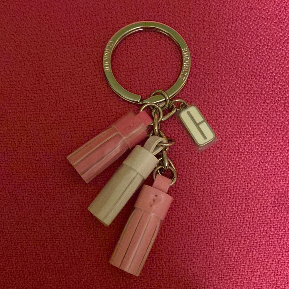 NWOT Clinique keychain/ring, never used, pink & white